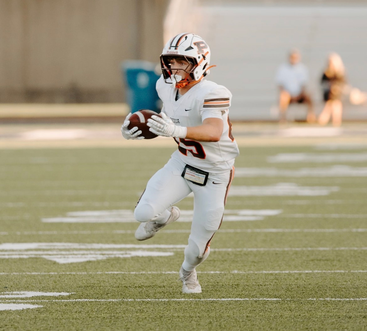 Maks Karasek #25 on the run in road whites