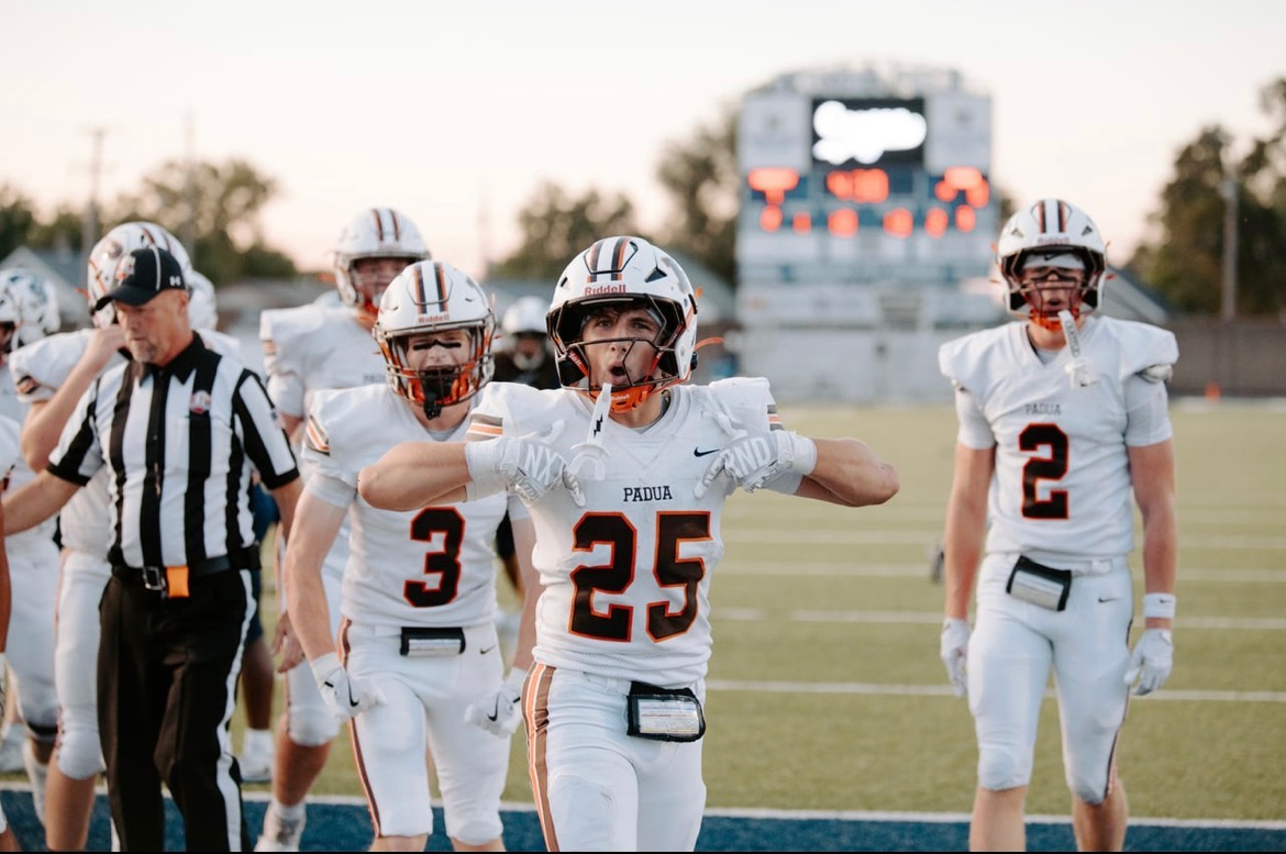 Maks Karasek #25 celebrates a play with teammates